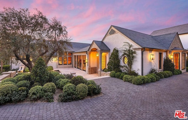 view of front of property with a patio area