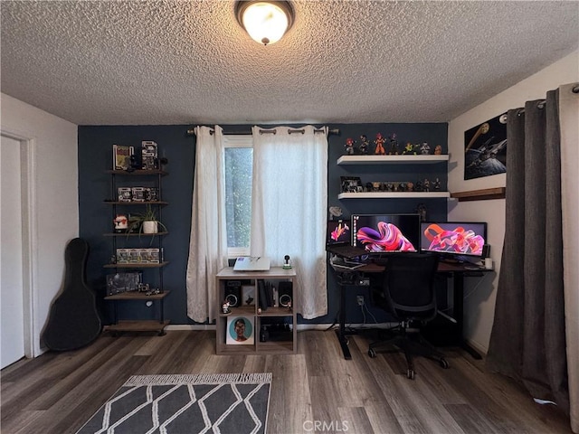 office area featuring hardwood / wood-style floors and a textured ceiling