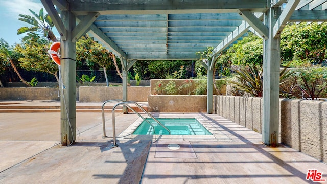 view of swimming pool with a community hot tub, a patio area, and a pergola