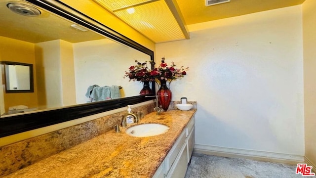 bathroom featuring vanity