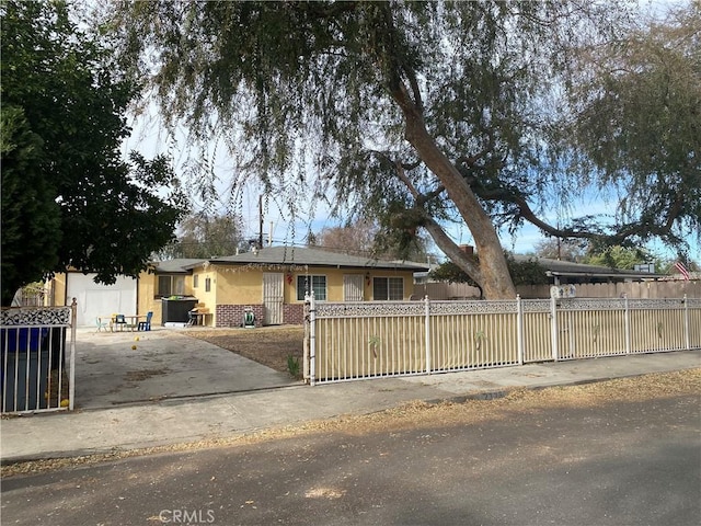 ranch-style home with a garage