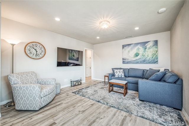 living room with hardwood / wood-style flooring