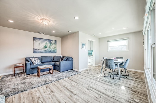 living room with light wood-type flooring