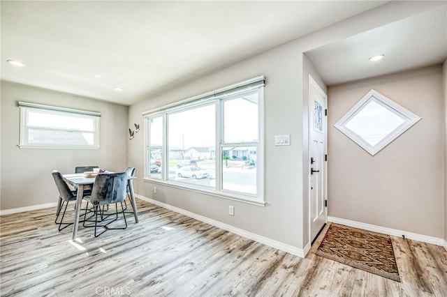 dining room with light wood-type flooring