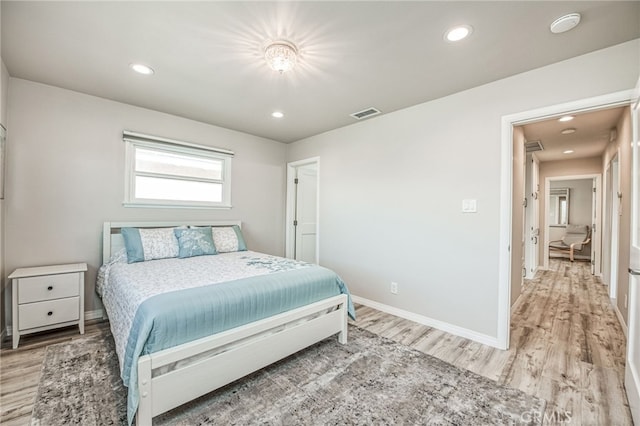 bedroom featuring hardwood / wood-style flooring