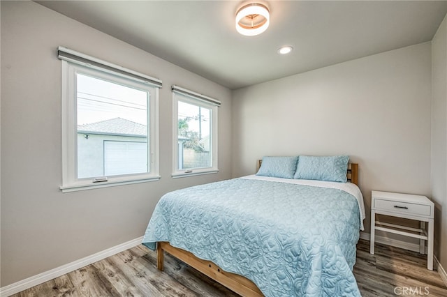 bedroom featuring hardwood / wood-style floors