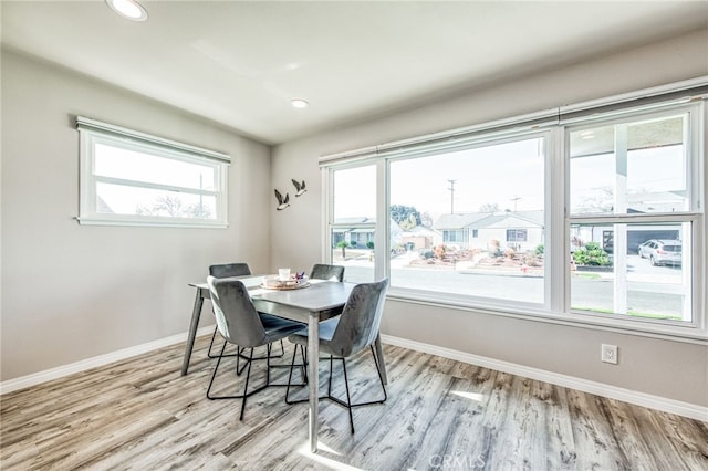 dining room featuring light hardwood / wood-style flooring