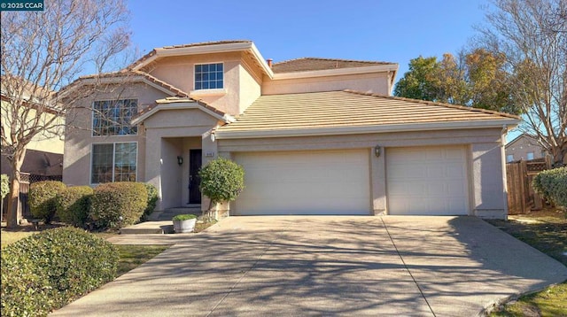 view of front of property with a garage