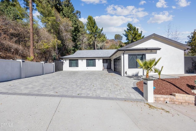 ranch-style home with a garage