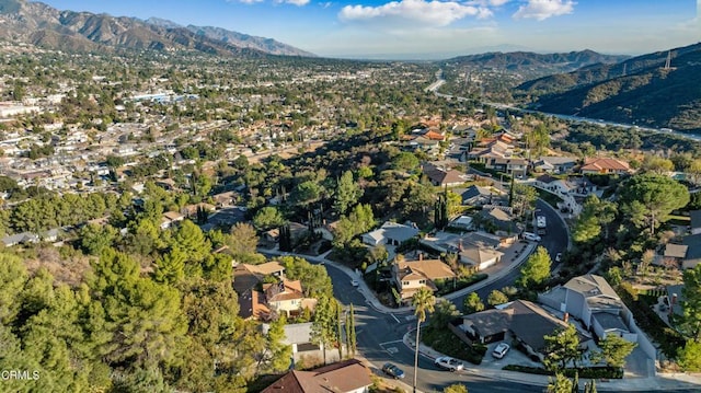 drone / aerial view featuring a mountain view