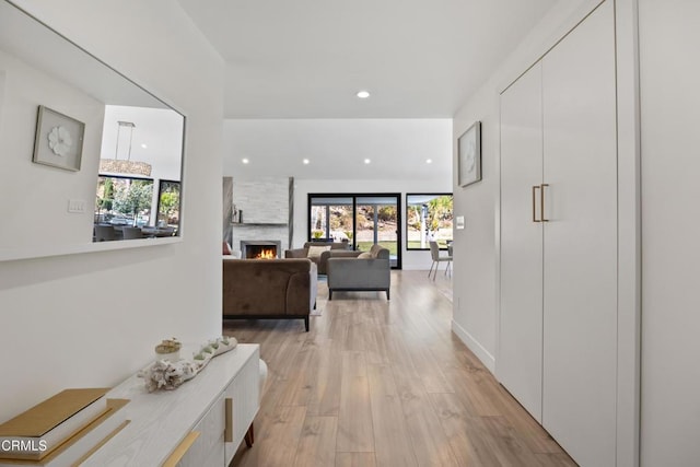 hall with light wood-type flooring