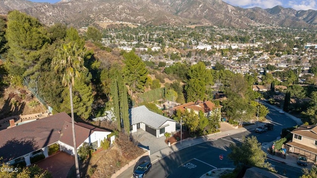 bird's eye view with a mountain view