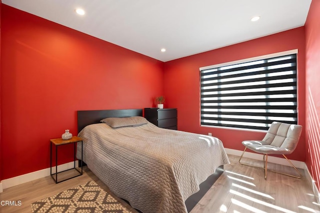 bedroom featuring light wood-type flooring