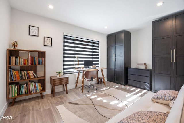 bedroom featuring light wood-type flooring