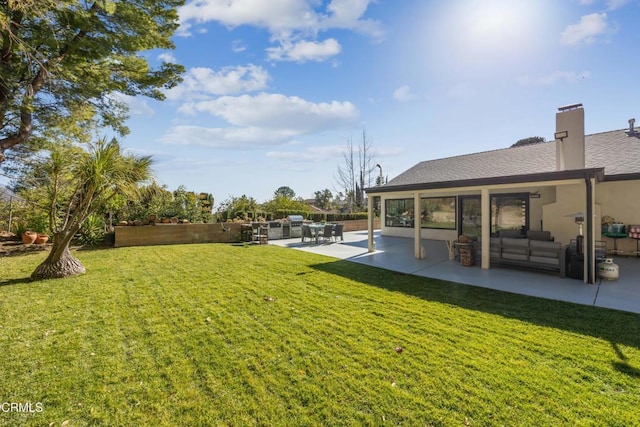 view of yard with a patio and outdoor lounge area