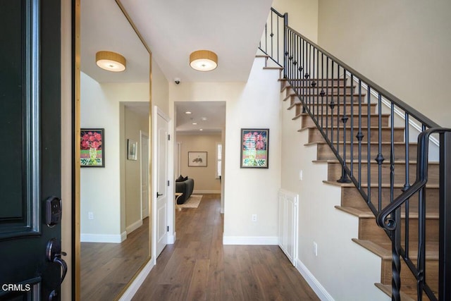 foyer featuring dark wood-type flooring