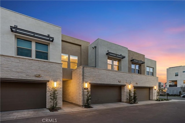 view of front of home with a garage