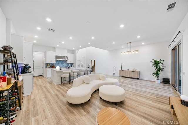 living room featuring light hardwood / wood-style flooring