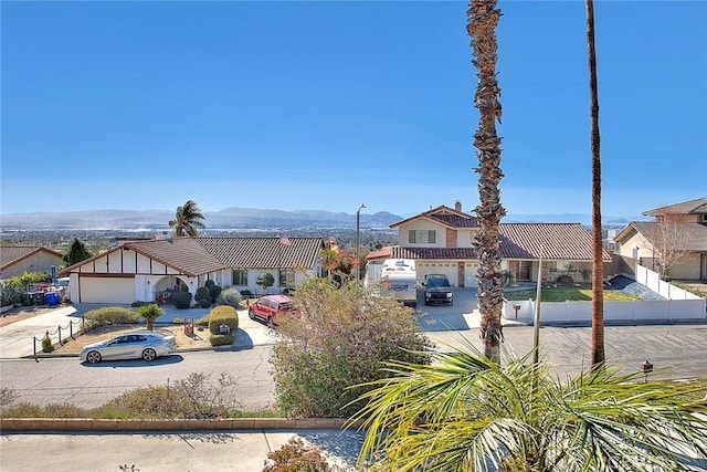 view of front of property with a mountain view