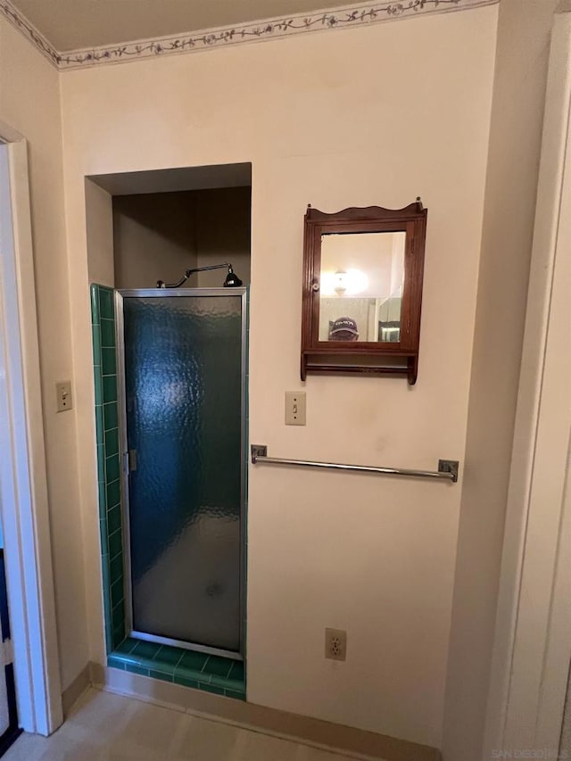 bathroom featuring walk in shower