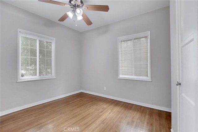 unfurnished room with ceiling fan and light hardwood / wood-style flooring