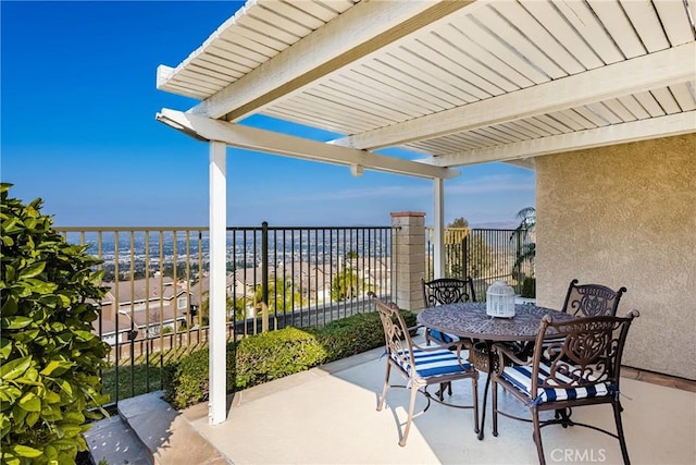 view of patio / terrace with a water view and a pergola