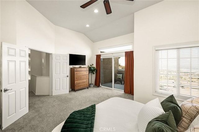 bedroom featuring ceiling fan, access to exterior, carpet, and multiple windows