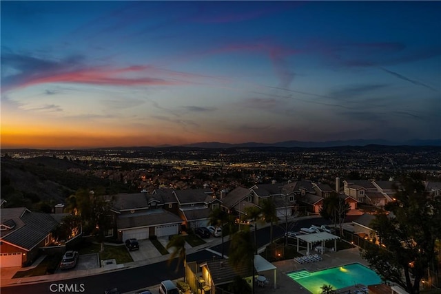 view of aerial view at dusk