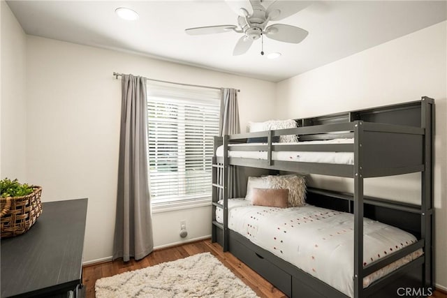 bedroom featuring ceiling fan and hardwood / wood-style floors