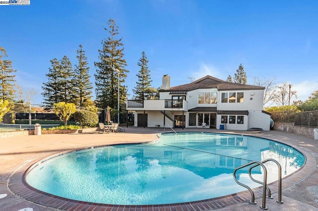 view of pool with a patio area