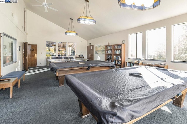 recreation room with carpet floors, high vaulted ceiling, and ceiling fan