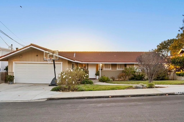 ranch-style home with a garage