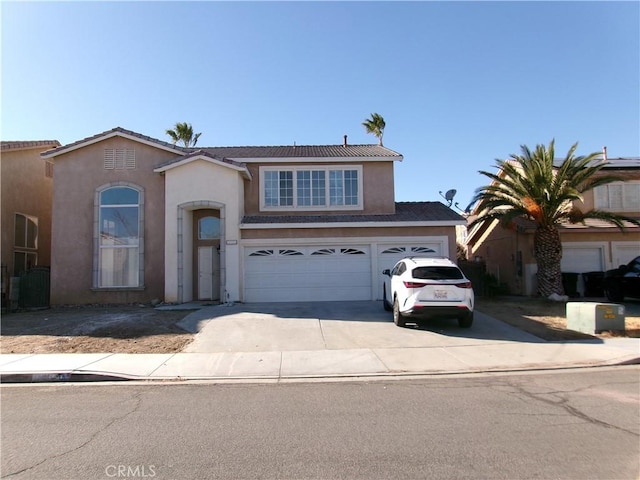 view of front of property featuring a garage