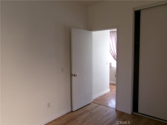 empty room with light wood-type flooring