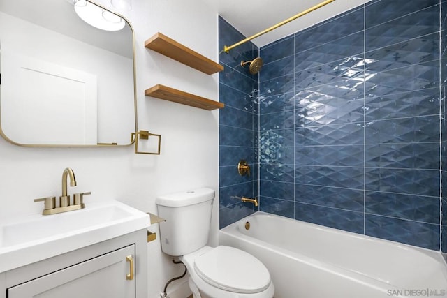 full bathroom with toilet, vanity, and tiled shower / bath combo