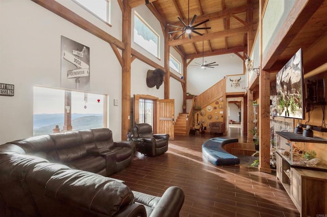 living area with a healthy amount of sunlight, wood ceiling, stairway, and wood finish floors