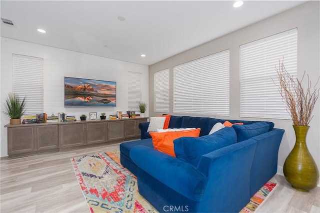 living room with light hardwood / wood-style floors