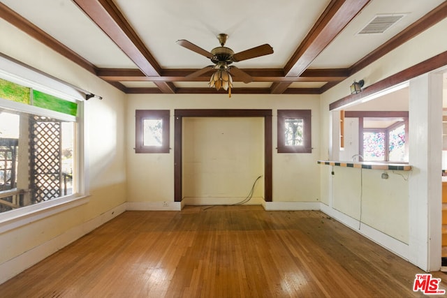 foyer with wood-type flooring, coffered ceiling, and beam ceiling