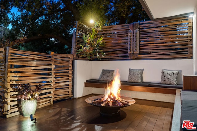 view of patio / terrace featuring a fire pit