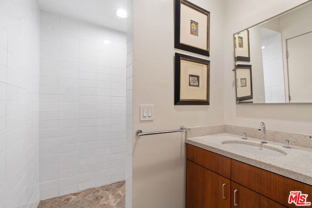 bathroom featuring vanity and walk in shower