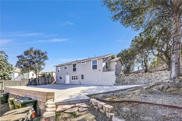 back of house featuring a patio