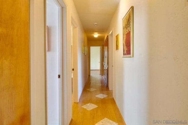 hallway featuring light hardwood / wood-style floors