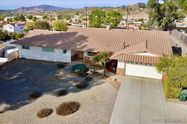 bird's eye view with a mountain view