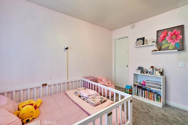 6949 Laguna Pl Unit B1, Rancho Cucamonga, CA 91701 - carpeted bedroom with a nursery area