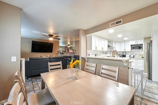 6949 Laguna Pl Unit B1, Rancho Cucamonga, CA 91701 - dining room with sink and ceiling fan