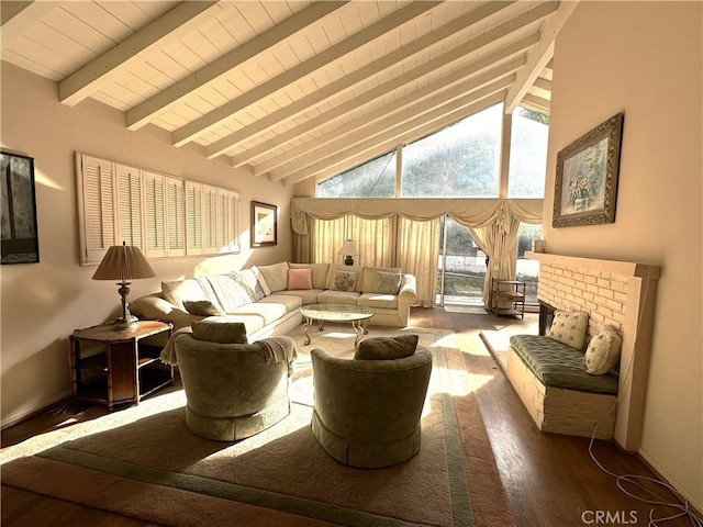 living room with beamed ceiling, wooden ceiling, a fireplace, wood-type flooring, and high vaulted ceiling