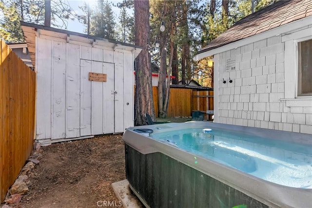 exterior space featuring a hot tub