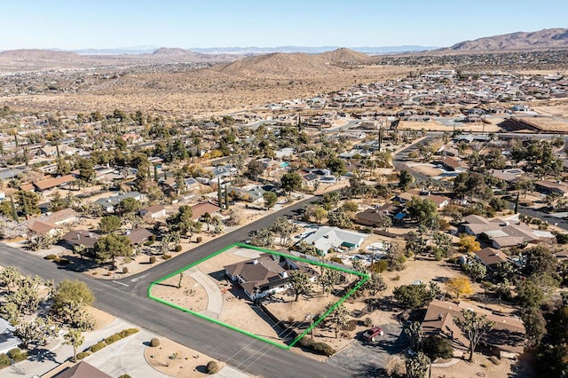 bird's eye view with a mountain view