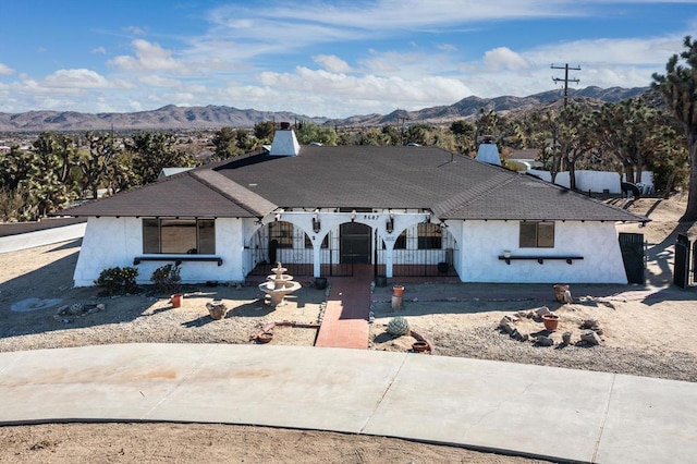 view of front facade with a mountain view