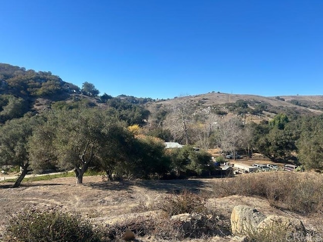 view of mountain feature featuring a rural view